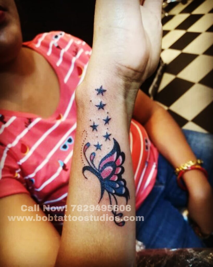 Butterfly with stars Tattoo Designs- Bob Tattoo Studio|Best Tattoo Studio in Bangalore|Best Tattoo Shop near me