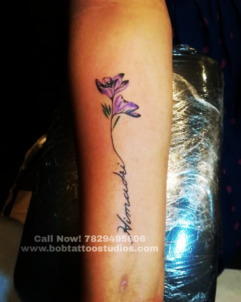 Name with flower Tattoo Designs- Bob Tattoo Studio|Best Tattoo Studio in Bangalore|Best Tattoo Shop near me