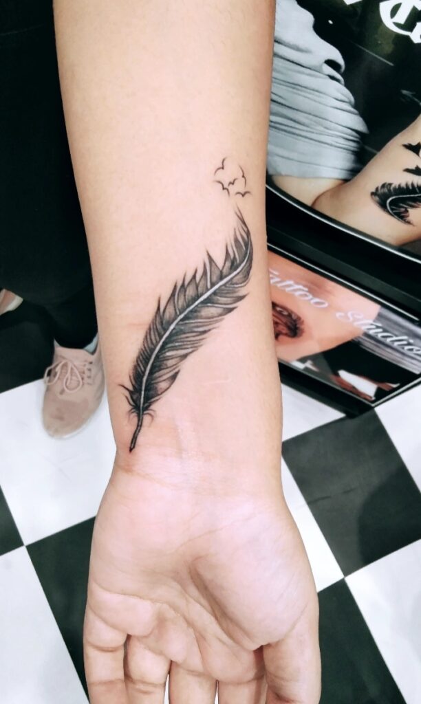 Feather Tattoo Designs - Bob Tattoo Studio